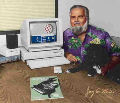 Jay Miner and his dog, Mitchy, whose paw print is moulded inside the A1000 case
